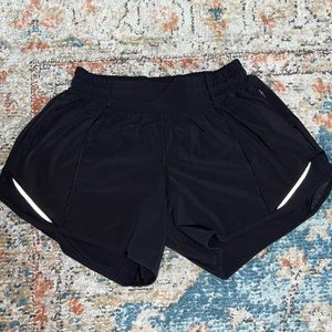 Lululemon pair of black Hotty Hot shorts. Size 4 Tall